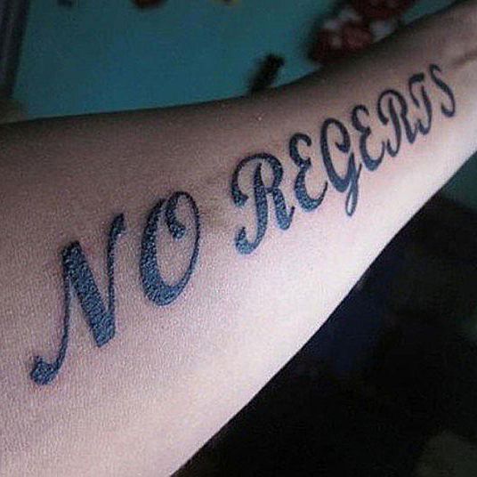 Bad spelling - 'no regrets' tattoo.